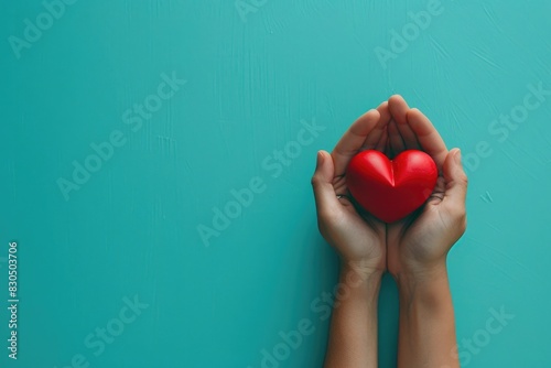 Donate for Charity: A Symbol of Love and Care with Heart in Hands on Blue Background