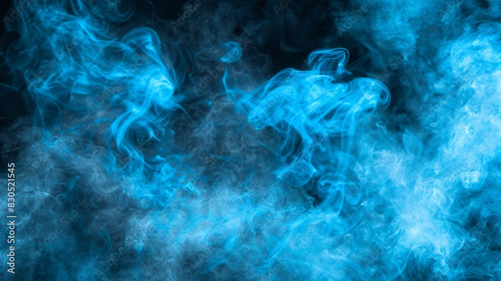 Obraz premium Blue smoke against a black backdrop, reminiscent of film or screen imagery