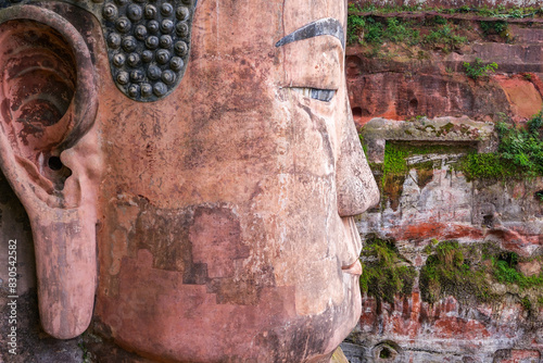 The Giant Leshan Buddha, in the southern part of Sichuan, China, near the city of Leshan, is the biggest and tallest stone Buddha statue in the world photo