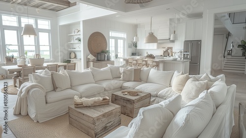 Coastal living room, modern farmhouse with white and beige tones, reclaimed wood accents, nautical pillows, open and spacious layout. Generative AI. © visoot