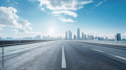 A sunny road surface under the background of modern urban skyline