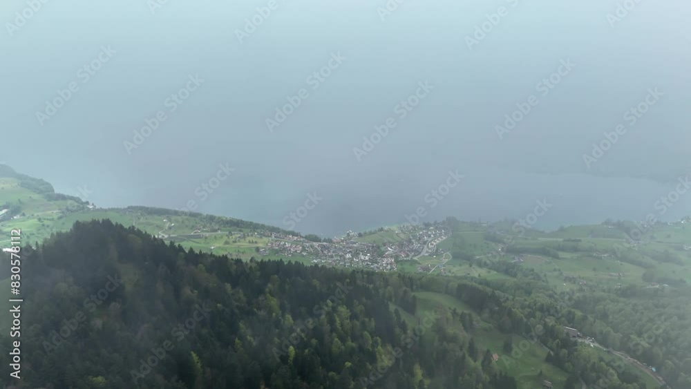 Aerial top down of weggis town and lake in Switzerland during cloudy day. Aerial top down of weggis town and lake in Switzerland during cloudy day.
