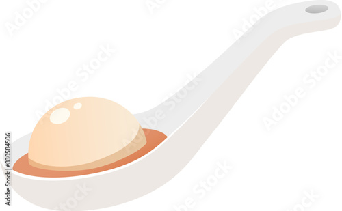 A glutinous rice ball on a spoon