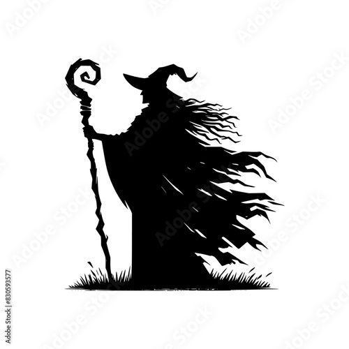 Black silhouette of a wizard holding his staff isolated on a white background.