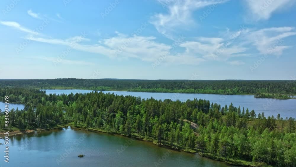 Lakes and wetlands in Vatsari wilderness, summer in Lapland - Aerial rising shot Lakes and wetlands in Vatsari wilderness, summer in Lapland - Aerial rising shot