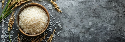 A bowl of white rice on a grey surface, wide panoramic banner with copy space. photo