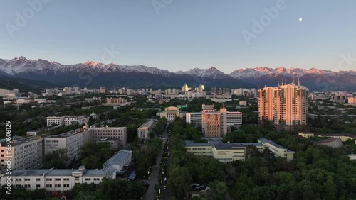 Wallpaper Mural View from a quadcopter of the central part of the Kazakh city of Almaty on a spring morning against the backdrop of a mountain range Torontodigital.ca