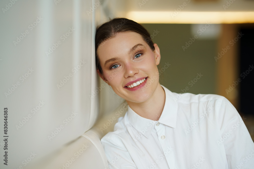 Beauty young woman in elegant clothes leaning on a cafeteria Beauty young woman in elegant clothes leaning on a cafeteria