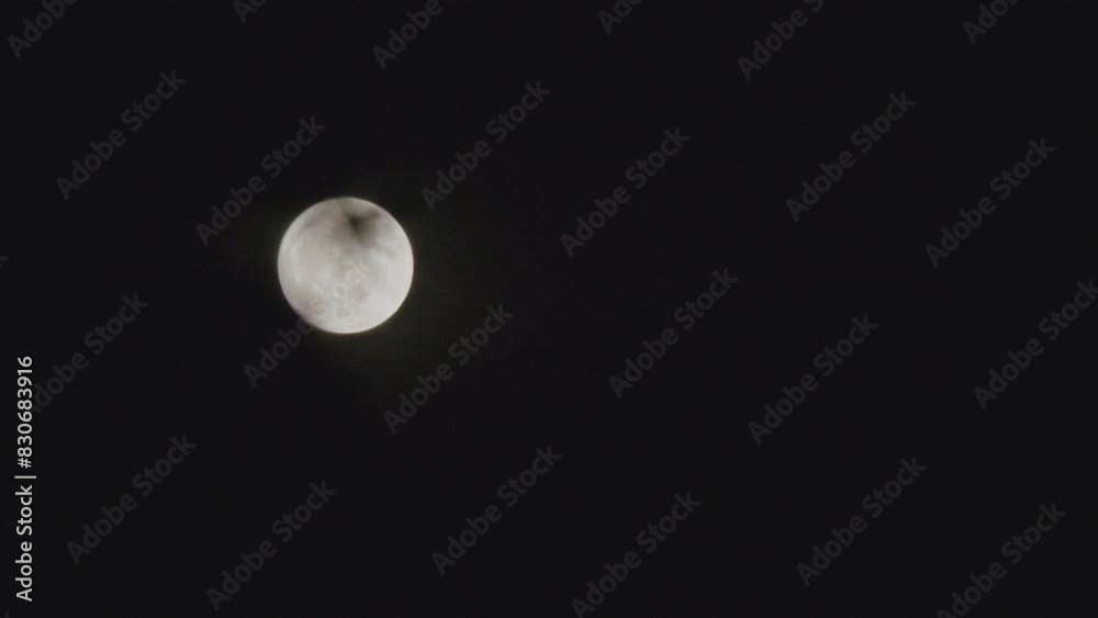 Establishing shot of a full moon at night Establishing shot of a full moon at night