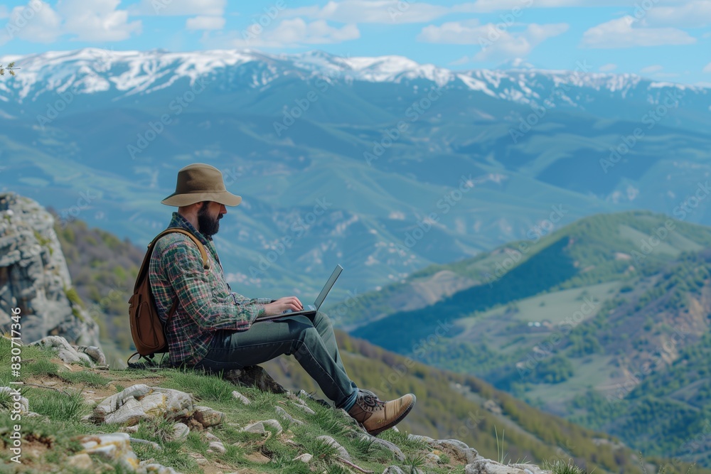 Freelancer Traveler Working Online with Laptop in Mountains