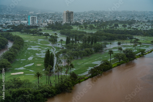 It's raining heavily in Honolulu, Oahu, Hawaii.  Ala Wai Golf Course / Ala Wai Canal photo