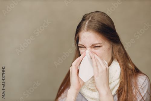 Young woman blowing nose has flu catarrh ill sick disease treatment cold