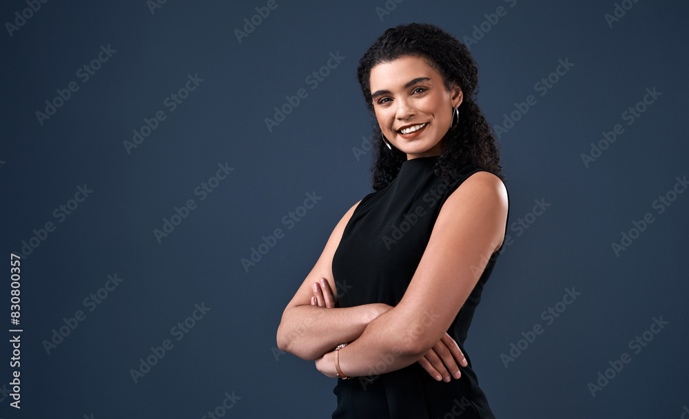 Businesswoman, smile and portrait in studio with arms crossed for confidence in corporate career. Worker, pride and happy isolated on blue background with lawyer, vision and about us with mockup Businesswoman, smile and portrait in studio with arms crossed for confidence in corporate career. Worker, pride and happy isolated on blue background with lawyer, vision and about us with mockup