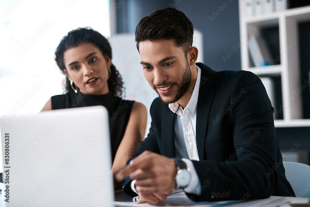 Corporate discussion, woman and man with laptop for planning project, meeting and research together by desk. Office, computer and business staff with collaboration for writing report and teamwork Corporate discussion, woman and man with laptop for planning project, meeting and research together by desk. Office, computer and business staff with collaboration for writing report and teamwork
