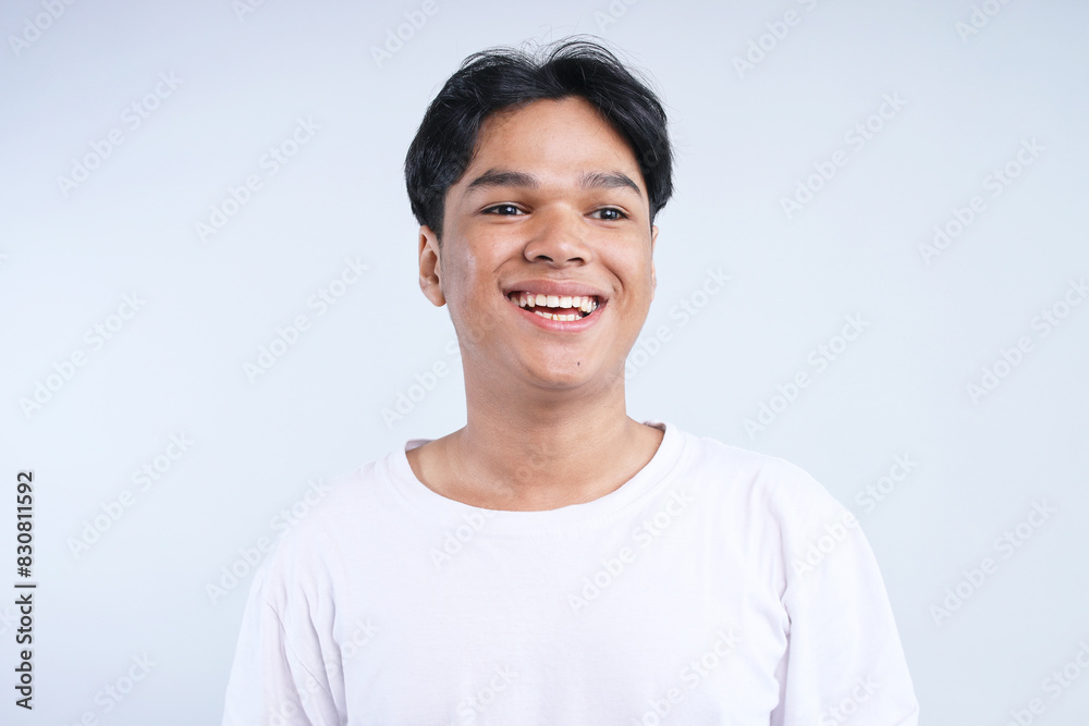 Potrait Of Young Asian Man Smiling Isolated On White Background Potrait Of Young Asian Man Smiling Isolated On White Background