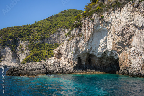 Rocky Cliff with Ionian Sea in Greek Island. Beautiful Rock Formation with Turquoise Water in Greece. Sunny Landscape in Zakynthos.