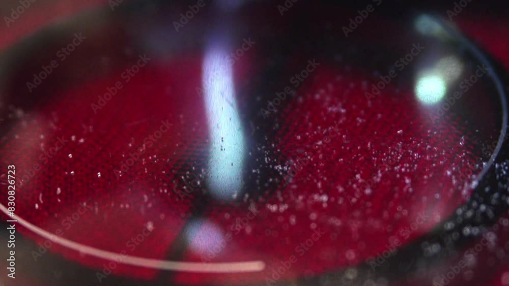 Students study leidenfrost effect at school. Physics lesson experiments. Science class. Water pours on red hot stove. Evaporation process. Steam rise into air. Warm cooker at kitchen. White vapor.