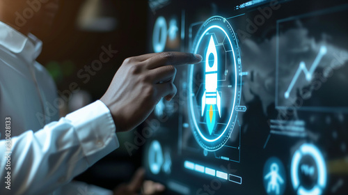 Close-up of a businessman showcasing a virtual screen with a globe, rocket icon, and up arrow, highlighting the concept of fast startup business and strategic planning