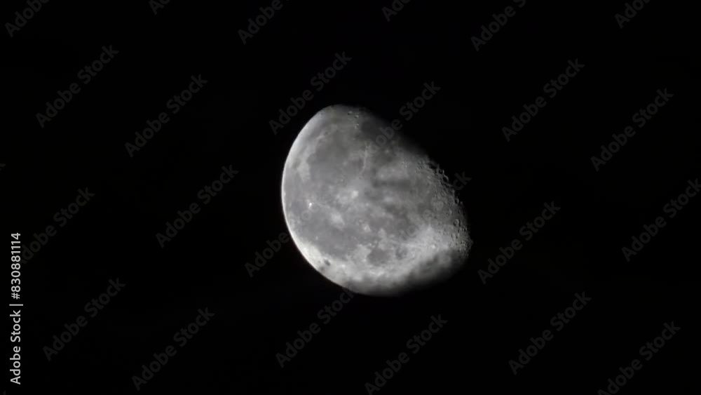 The Moon with clouds passing by on a beautiful clear night - 10x normal speed The Moon with clouds passing by on a beautiful clear night - 10x normal speed