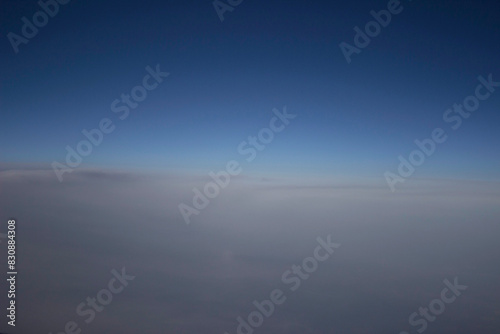Blue Sky with Clouds Aerial View. Travel Concept. Travel by Plane.