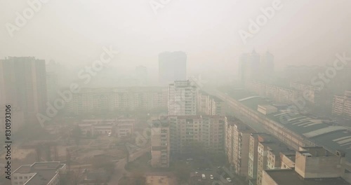 Odessa aerial view following a cyclist walking on a road around a tree