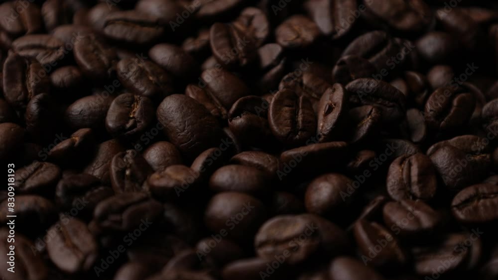Closeup of a bean, Dark of brown roasted coffee beans background