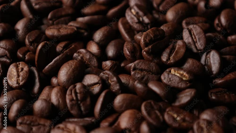 Closeup of a bean, Brown roasted coffee beans background Closeup of a bean, Brown roasted coffee beans background