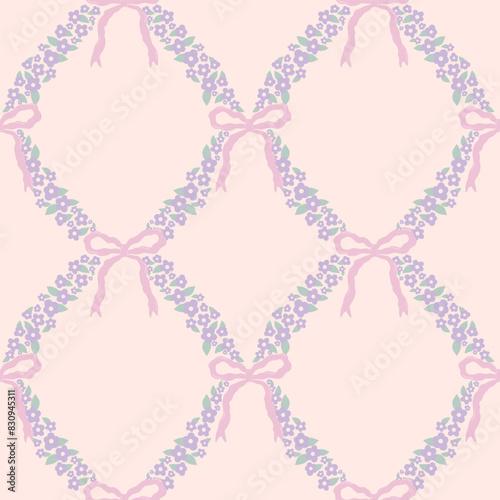 Cute seamless pattern with pink ribbon bows and small flowers.