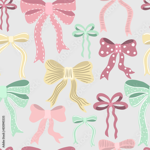 Trendy seamless pattern with different shapes ribbon bows.