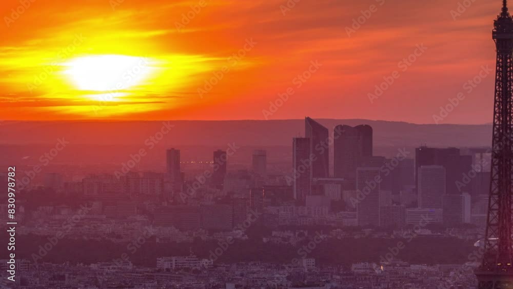 Panorama of Paris at sunset aerial timelapse. Eiffel tower view from observation deck of montparnasse building in Paris - France. Colorful sky at summer day Panorama of Paris at sunset aerial timelapse. Eiffel tower view from observation deck of montparnasse building in Paris - France. Colorful sky at summer day