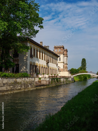 Historic buildings along the cycleway of Naviglio Grande, Milan, Italy, at Robecco photo