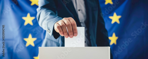 Man casting vote into a ballot box in front of European Union flag. Animated illustration representing EU elections. photo
