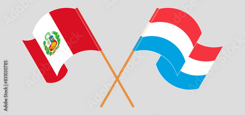 Crossed and waving flags of Peru and Luxembourg