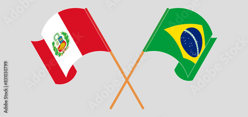 Crossed and waving flags of Peru and Brazil