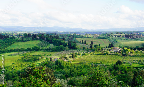 The view of green hills of Tuscany as seen from San Gimignano 