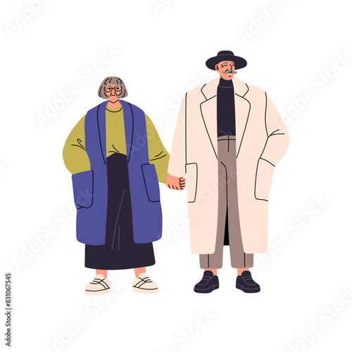 Modern senior couple standing together. Old lovers, man and woman in glasses hold hands. Aged people wearing stylish hat, fashion raincoat. Flat isolated vector illustration on white background