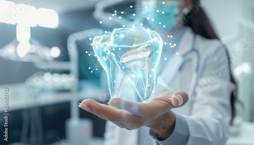 The photo shows a dentist holding a 3D tooth model photo