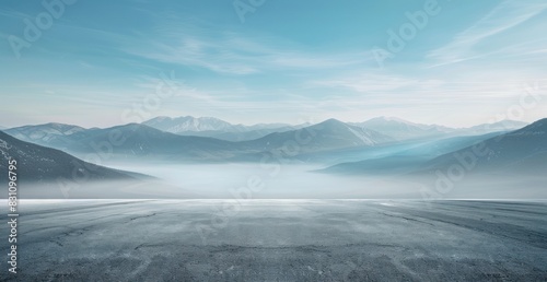 Beautiful blue mountain background with fog and empty asphalt floor