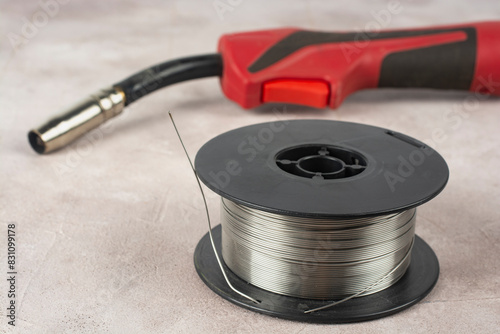Foto Spool of wire for semi-automatic welding machine MIG MAG