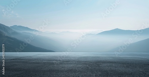 Beautiful blue mountain background with fog and empty asphalt floor