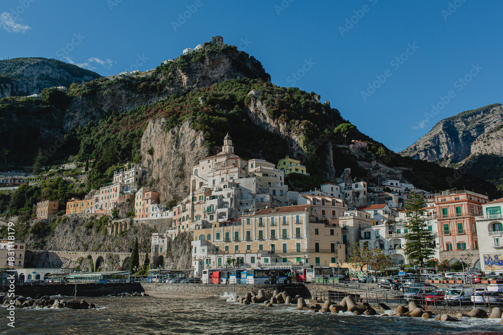 Coastal view of old historic Italian architecture. Traditional European old town buildings in Amalfi, Salerno, Italy. Vacation travel background Coastal view of old historic Italian architecture. Traditional European old town buildings in Amalfi, Salerno, Italy. Vacation travel background