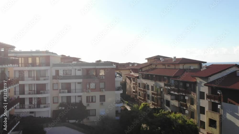 Aerial drone view of houses with red tiles and hotels, sea and beach of Sveti Vlas in Bulgaria from above, top view from drone on sunrise. Summer holiday in Europe. Black sea
Aerial drone view of houses with red tiles and hotels, sea and beach of Sveti Vlas in Bulgaria from above, top view from drone on sunrise. Summer holiday in Europe. Black sea