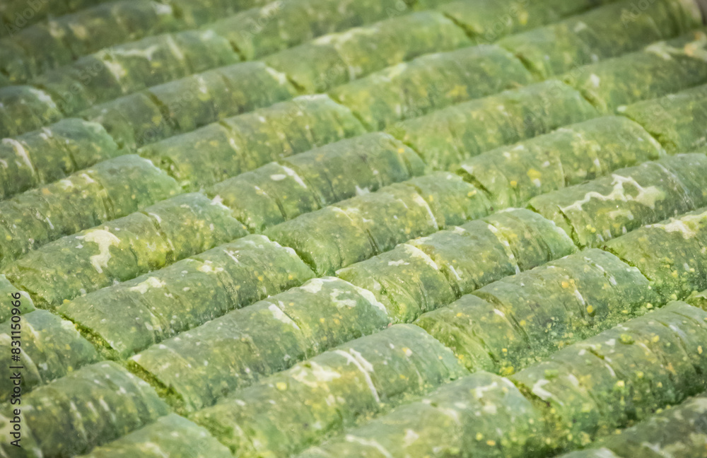 Fototapeta premium Turkisch baklava with pistachio, nuts and honey
