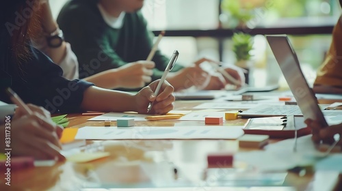 Business meeting time Photo young account managers crew working with new startup project Notebook on wood table Idea presentation analyze plans Widefilm effect : Generative AI