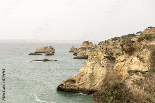 Cliffs on the coast of Portimao - Portugal photo
