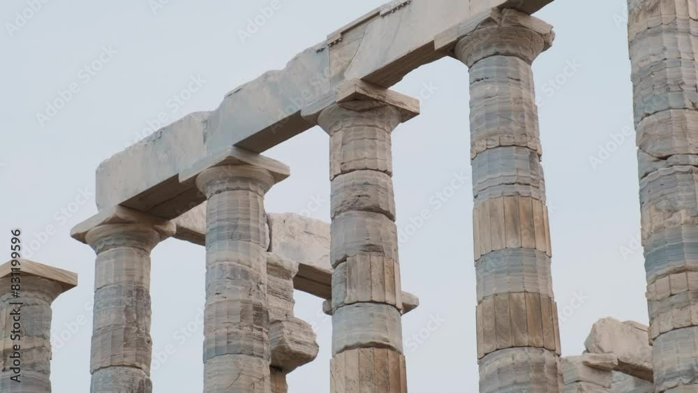 Temple of Poseidon on Cape Sounion at sunset, Attica, Greece. Ancient Greek architecture. Ruins of ancient temple of Greek god of the sea with columns