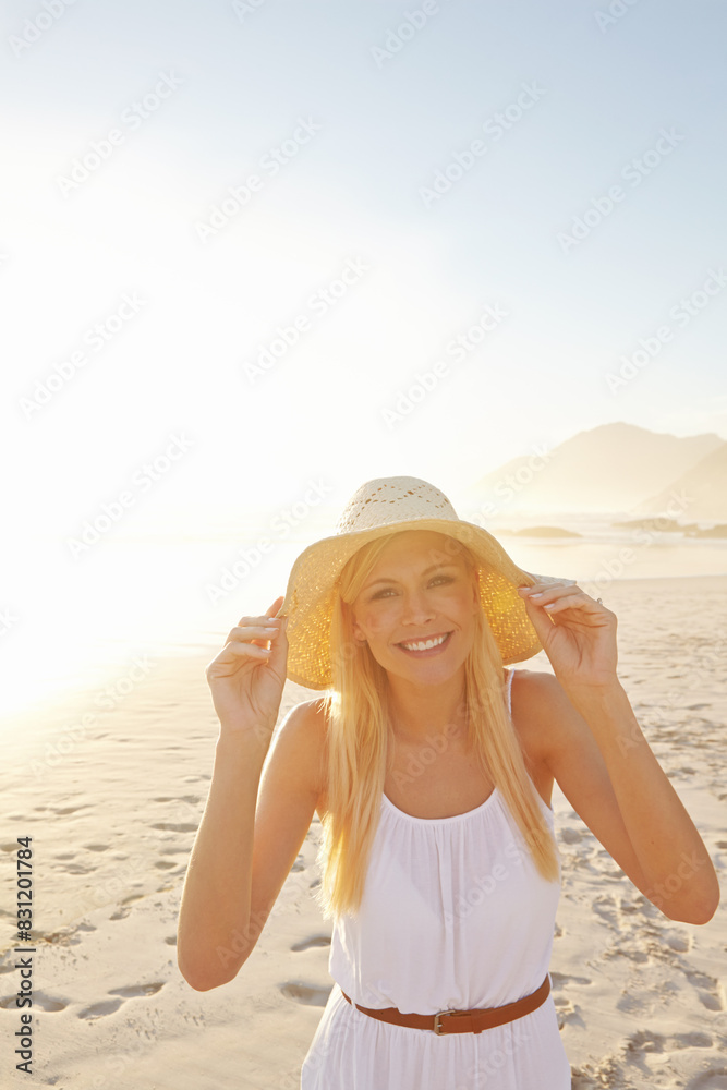 Portrait, beach and woman in nature with hat for summer vacation, holiday trip or tropical getaway. Travel, outdoor and female person with smile for happiness, weekend adventure or journey to Mexico