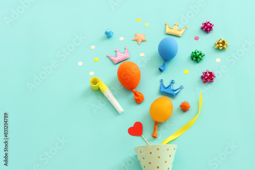 Top view image of party and birthday item on blue background