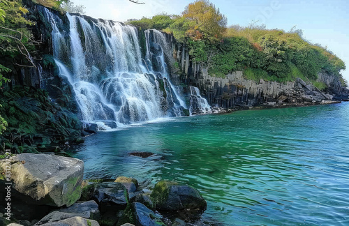 The waterfall on the coast of the evacuated island in China, with clear water and green vegetation. Created with Ai
