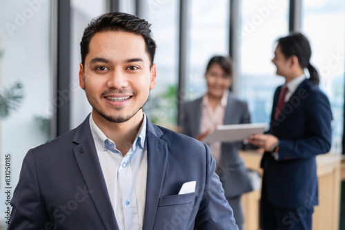 portrait of a smiling business man, professional team in office